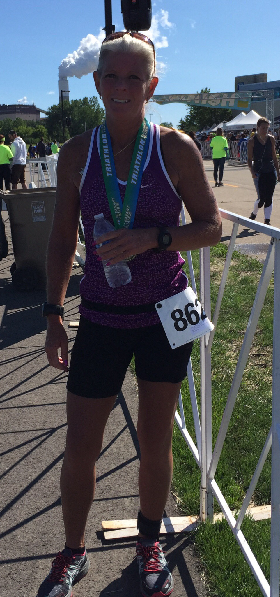 testimonial-10-17 woman smiling after finishing marathon